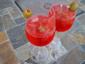 Red campari spritz inside glasses