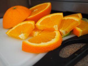 Sliced oranges on a cutting board