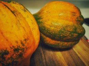 Two acorn squashes.