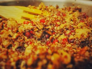 The filling for the acorn squash in the frying pan.