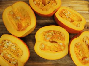 raw pumpkins sliced in half