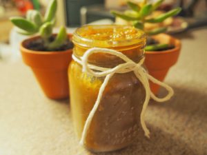 A mini mason jar filled with pumpkin butter