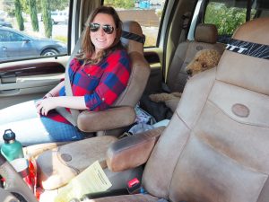 Caitlin and Oakley in the truck.