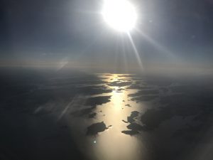 Sunset over Sweden's archipelago from an airplane.