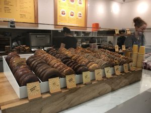 An assortment of bagels in the window.