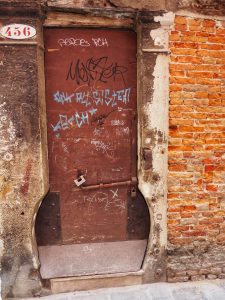 A door shaped like a keyhole.