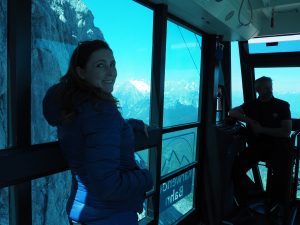 Caitlin in a cable car.