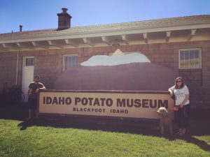 Caitlin, Tucker, and Oakley in front of the Idaho Potato Museum.