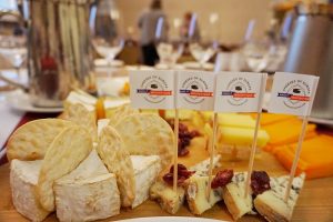 A close-up view of bleu cheese with small flags.