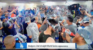 Justin Turner drinking a Budweiser during the team celebration.