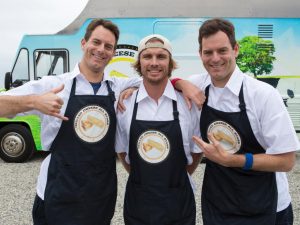 The cheese twins posing on their Food Network show.