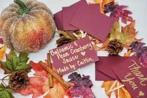 Small food labels surrounded by fall decor