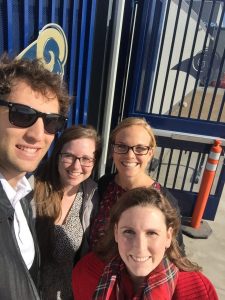 Caitlin and three colleagues visiting the Rams practice facility.