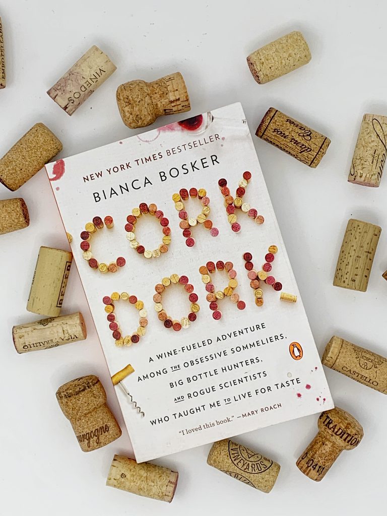 Photo of Cork Dork by Bianca Bosker surrounded by corks.