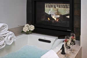 The jacuzzi tub and see-through fireplace at Youngberg Hill's Jura Suite. 