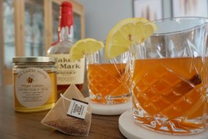 Close up of pumpkin spice hot toddies with ingredients