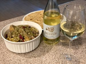 Dinner spread of Rhapsody Pinot Blanc, an Oregon wine from the Willamette Valley, and Greek lamb stew.