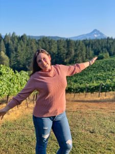 Caitlin in front of Mt. Hood in the Phelps Creek Vineyard