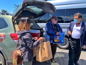 Bob distributing packed lunches for everyone