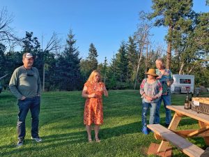 Happy hour on the lawn next to the Phelps Creek vines