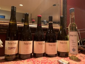 Lineup of bottles from Phelps Creek Vineyards