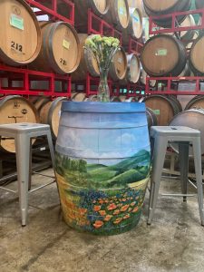 Barrel and stools in the barrel room at Omega Road.